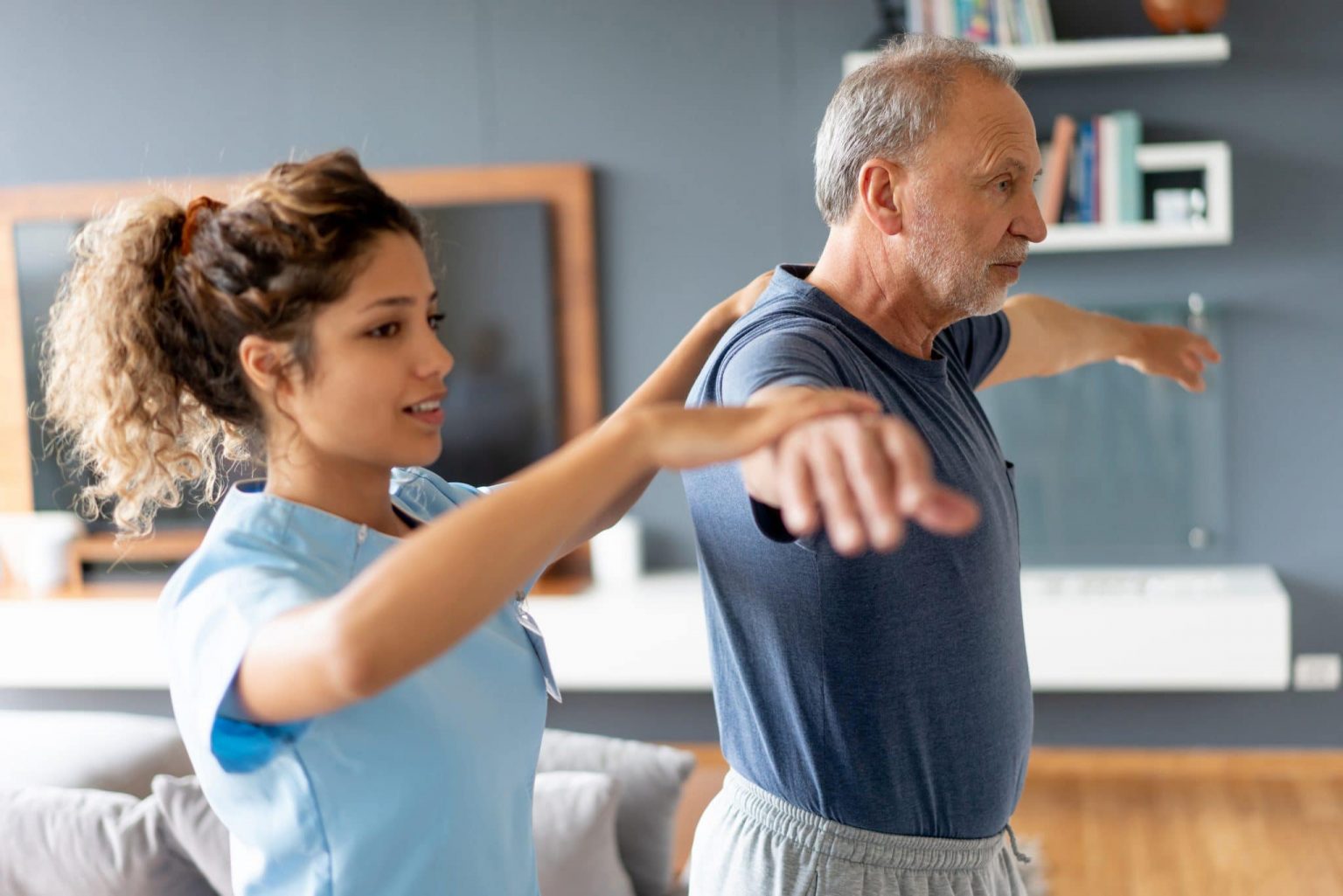 doctor walking a patient through a balance test Doctor helping Patient execute a Balance Test