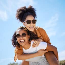 A happy young couple enjoys a hot summer day