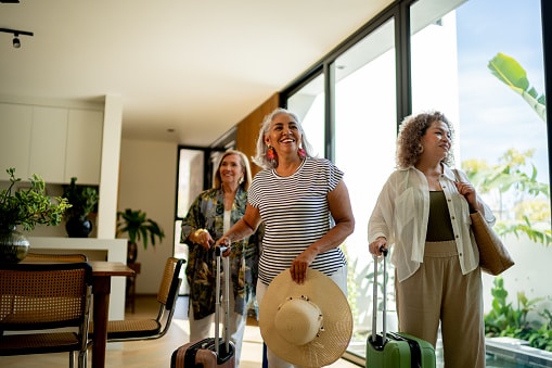 Group of friends arrives at their vacation rental home, ready for a thrilling, relaxing vacation.