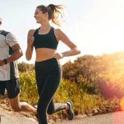 Shot of a fit young couple going for a run outdoors
